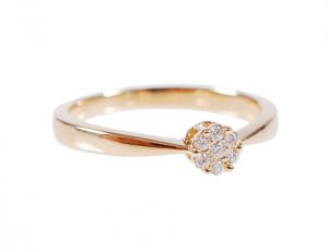Diamond dot engagement ring in 14-karat gold with .08-carat diamond cluster detail..jpg